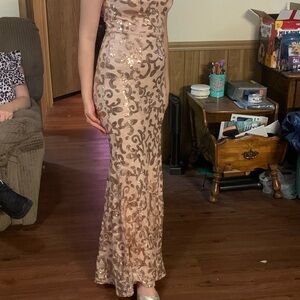 Gold dress size 3.  Just tried on never worn.